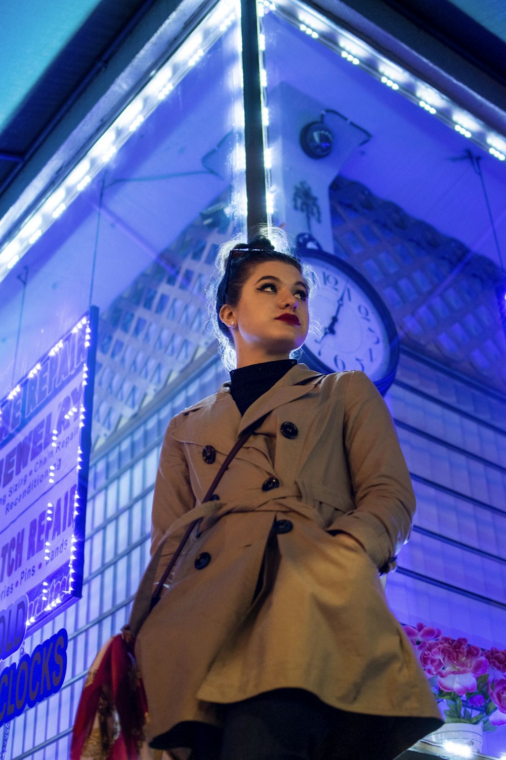 woman wearing brown coat