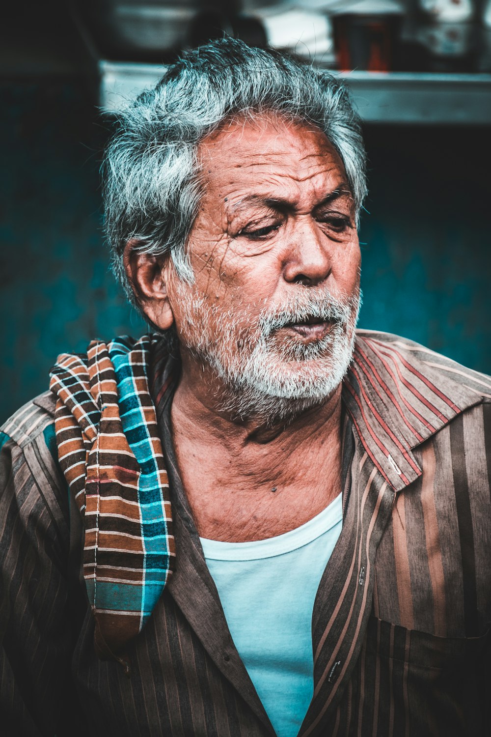 man wearing brown dress shirt