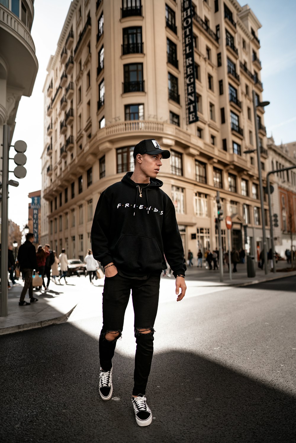 man standing near Flat Iron building during daytime