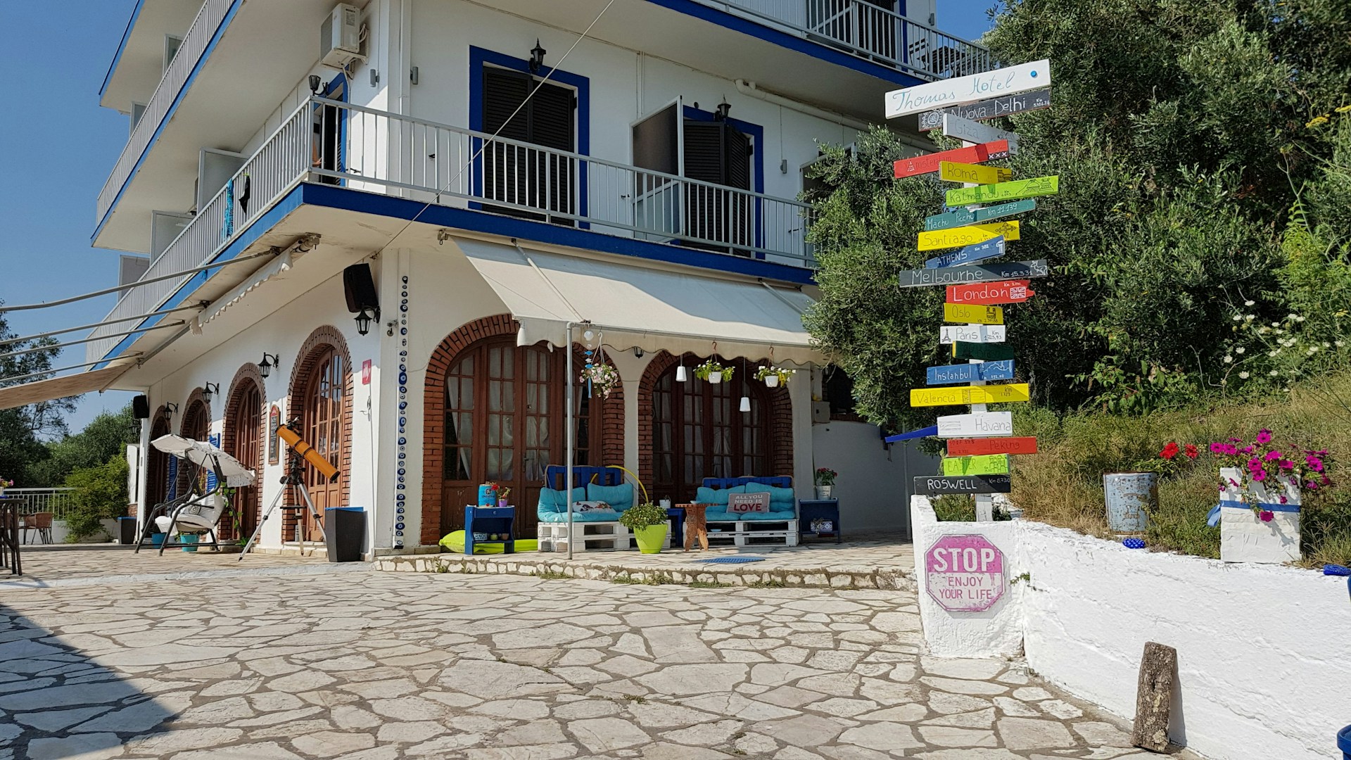 woman wearing yellow long-sleeved dress under white clouds and blue sky during daytime
