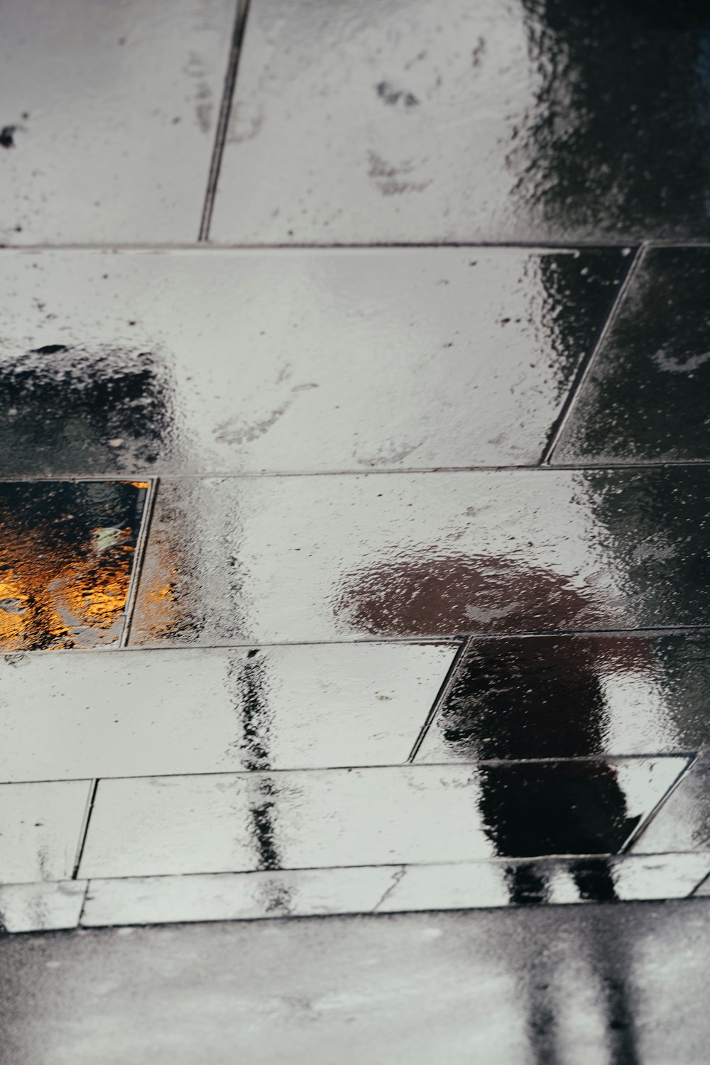 reflection of person with umbrella on the wall