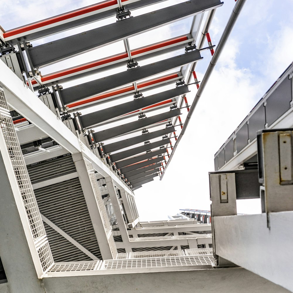 a metal structure with a sky in the background