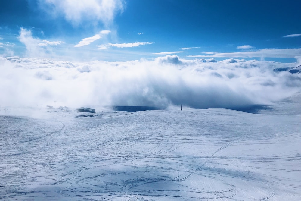 thick white fogs covering snow slope