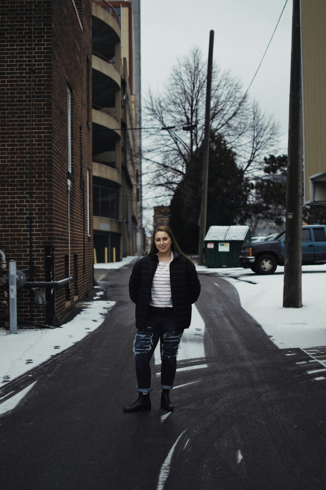 woman standing on road