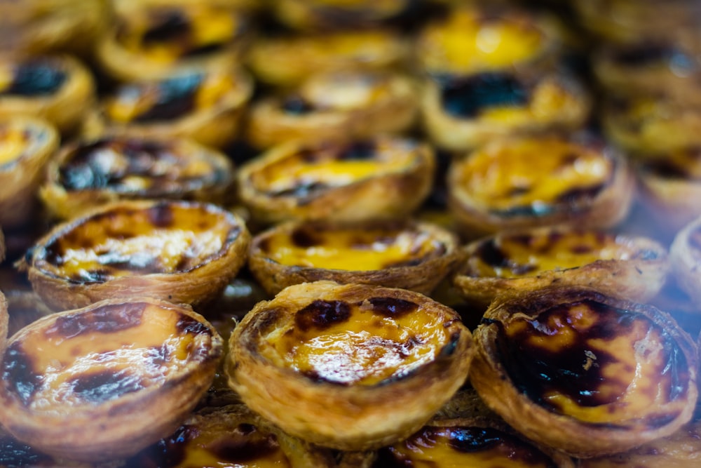 a close up of a bunch of pastries on a table