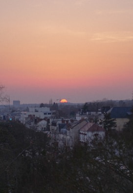 Sunset view over the Pasadena skyline with soft pink and orange hues.