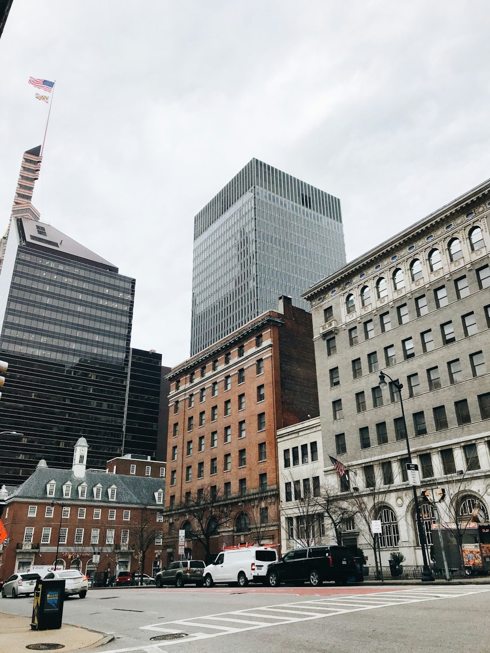 parked vehicles beside buildings