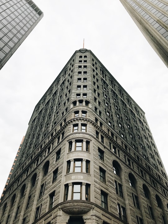 gray high-rise building beside other buildings during daytime in One Charles Center United States