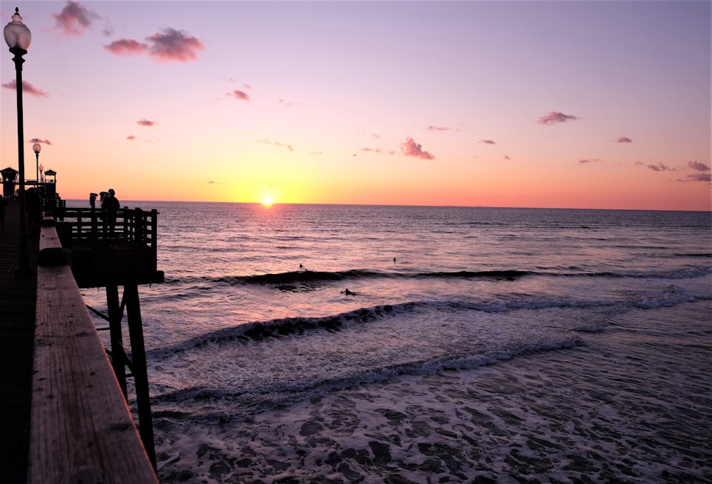 panoramic photography of shore during sunset