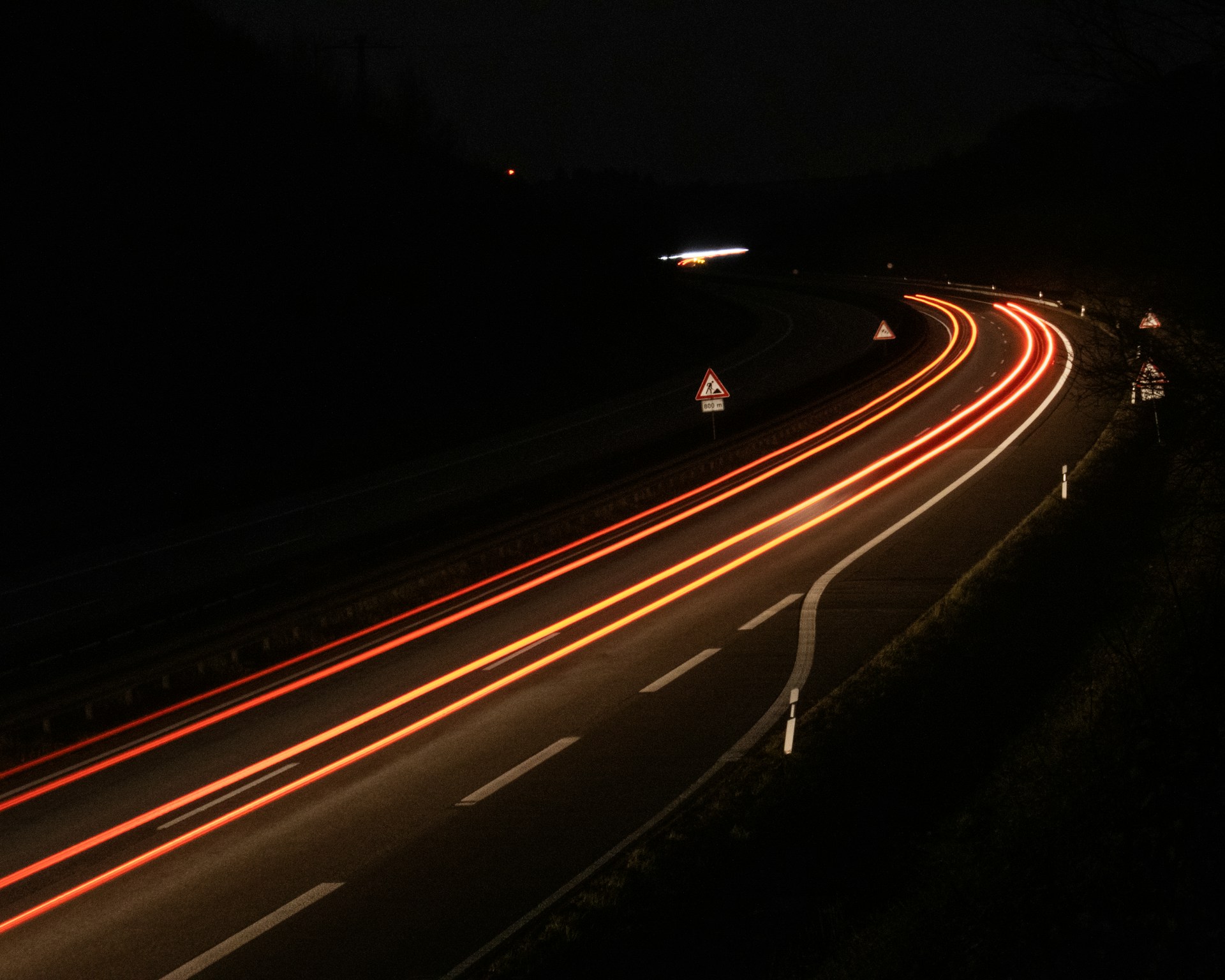 lighted asphalt road