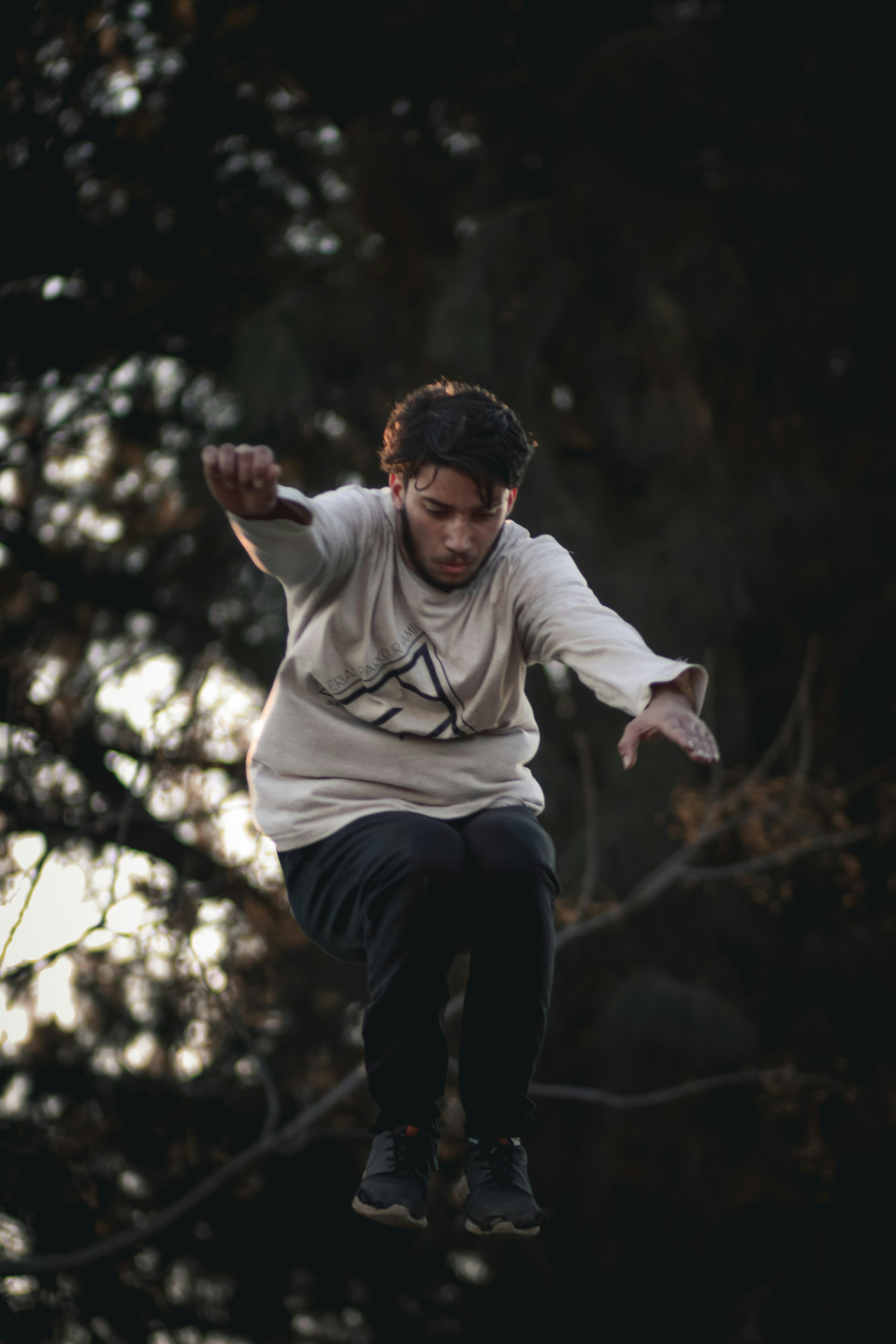 men's white and black sweatshirt close-up photography