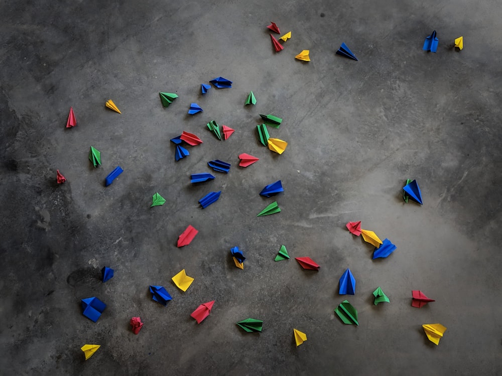 origamis on concrete pavement