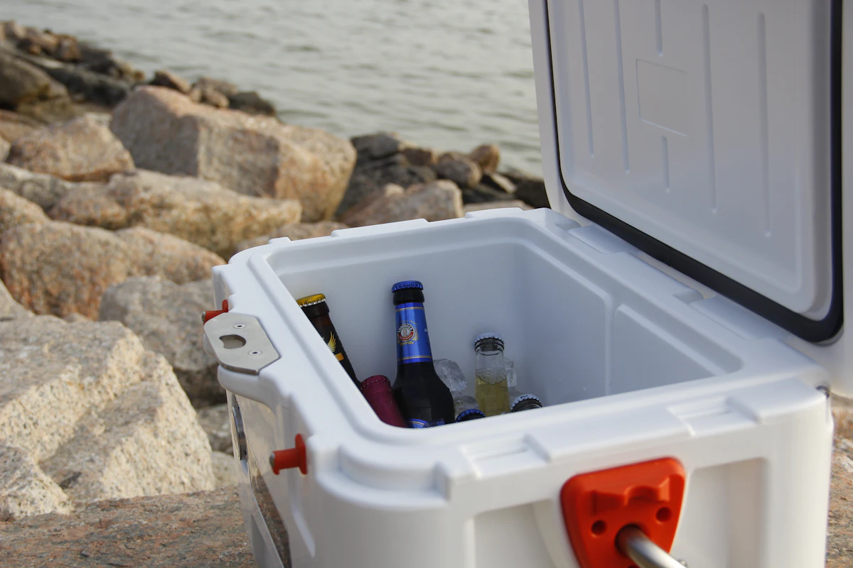 Heavy duty outdoor rotomolded cooler at wilderness campsite
