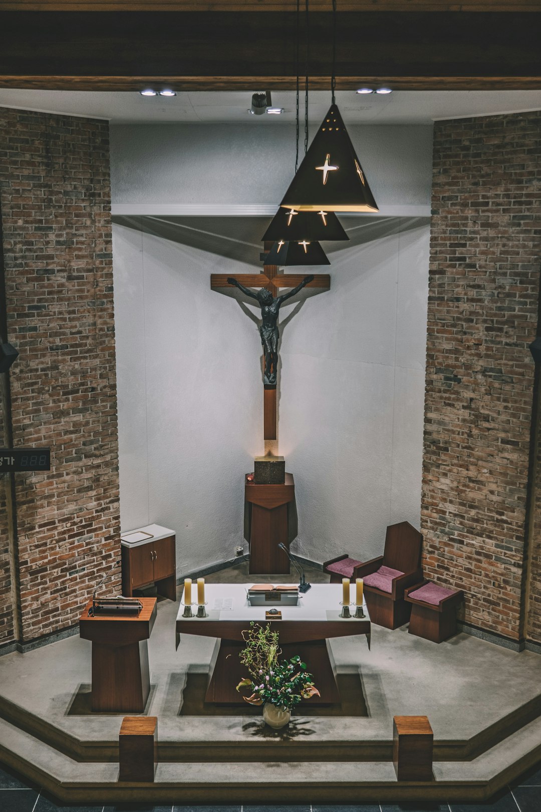 flower in front of altar and Crucifix