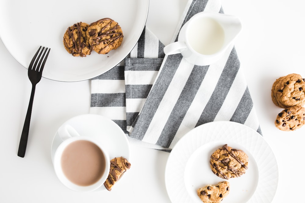 cookies on plates above gray and white textle