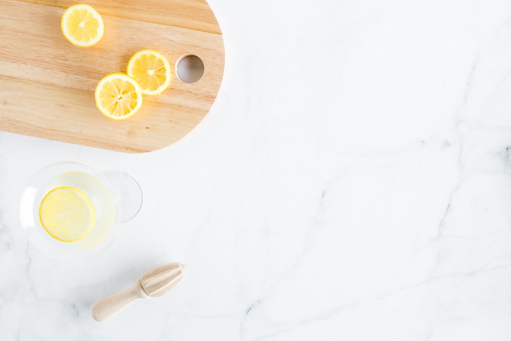 sliced citrus fruits on cutting board