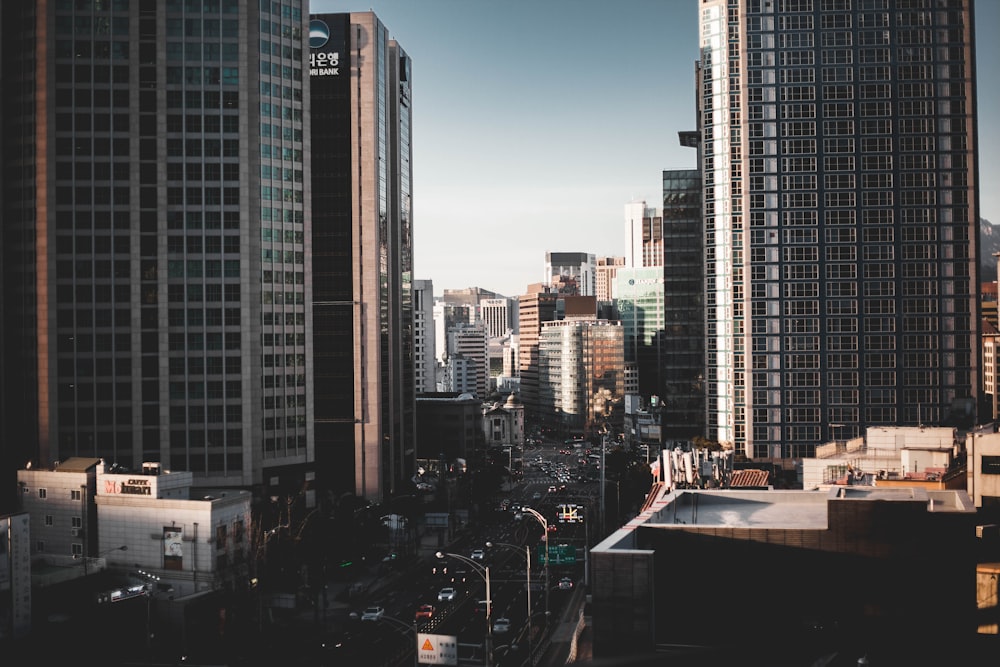 high rise buildings near road during daytime