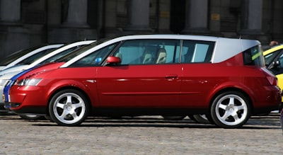 red and gray 3-door hatchback renault google meet background