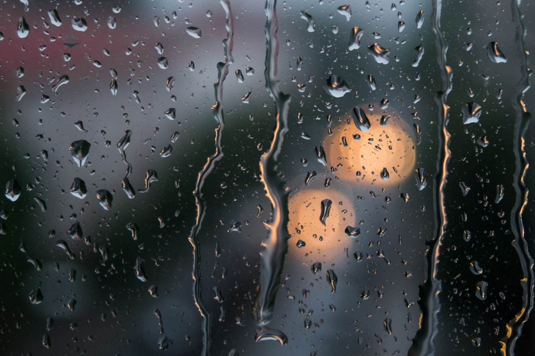 water drops on clear glass panel