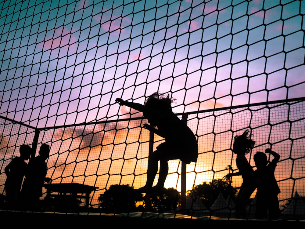 silhouette of playing girl
