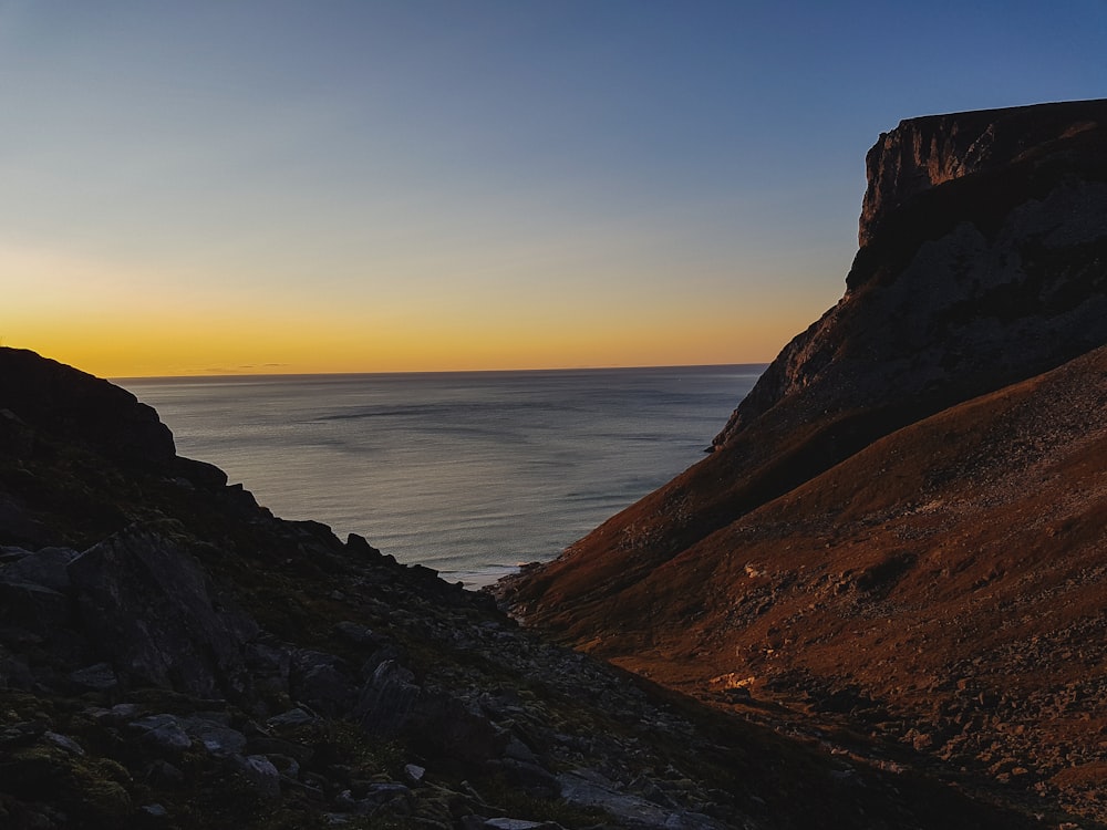 brown cliffs near ocean