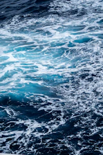 choppy ocean waves with foam