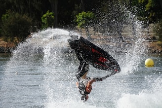 person riding on personal watercraft