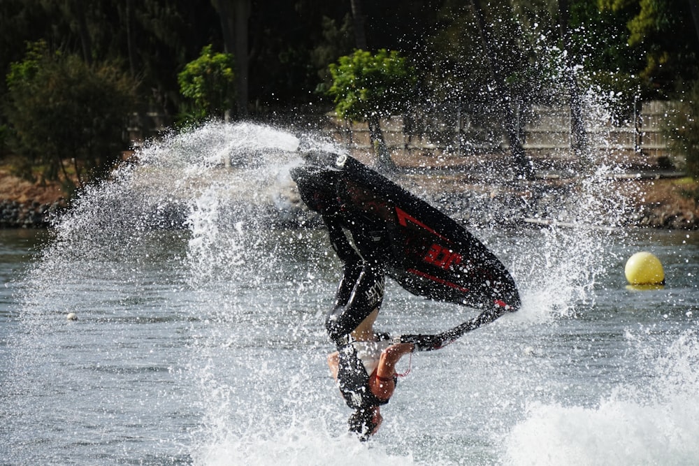 person riding on personal watercraft