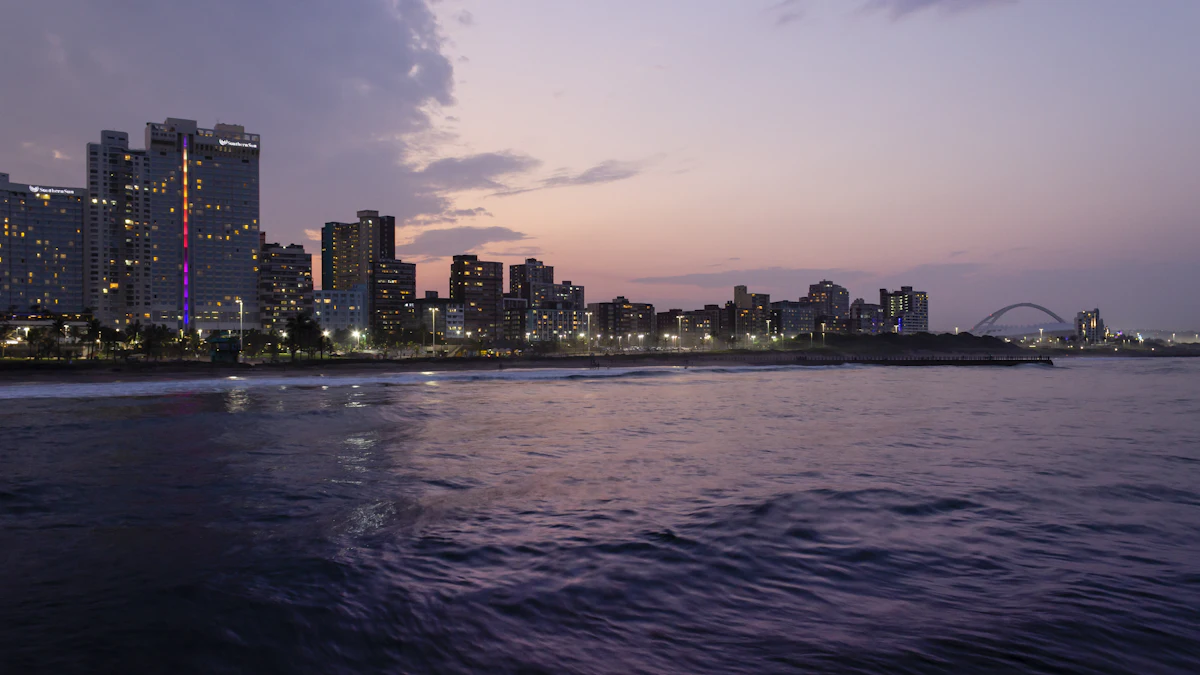 Panoramic view of lit buildings in Durban
