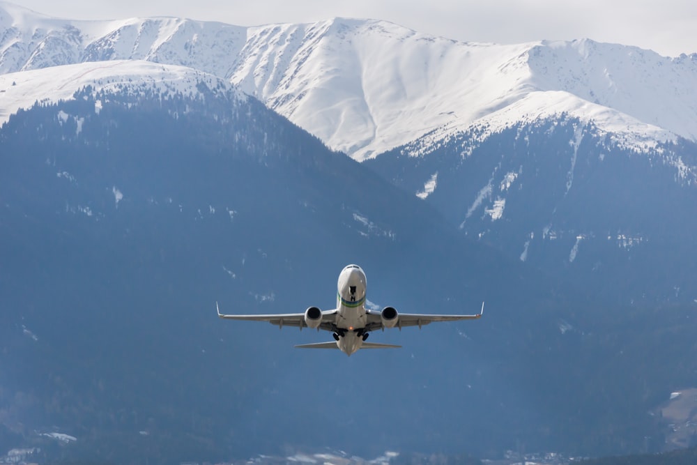 whit airplane during daytime