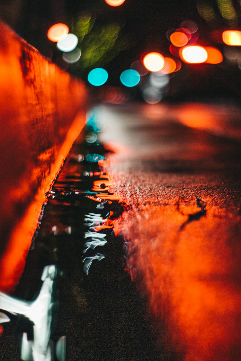 selective focus photography of water beside road