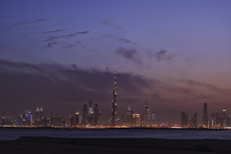 a view of a city at night from across the water