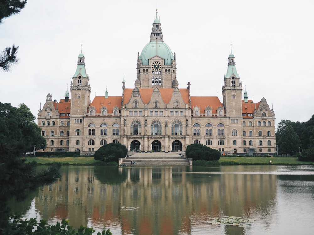 lake in front of building