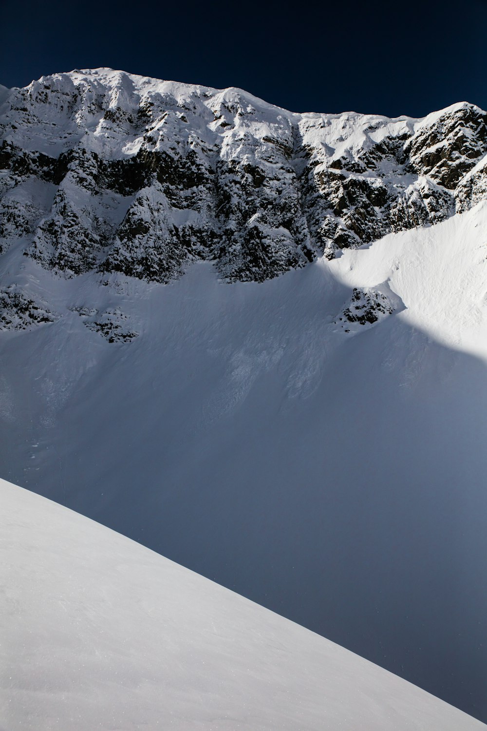 snow covered mountain during daytime