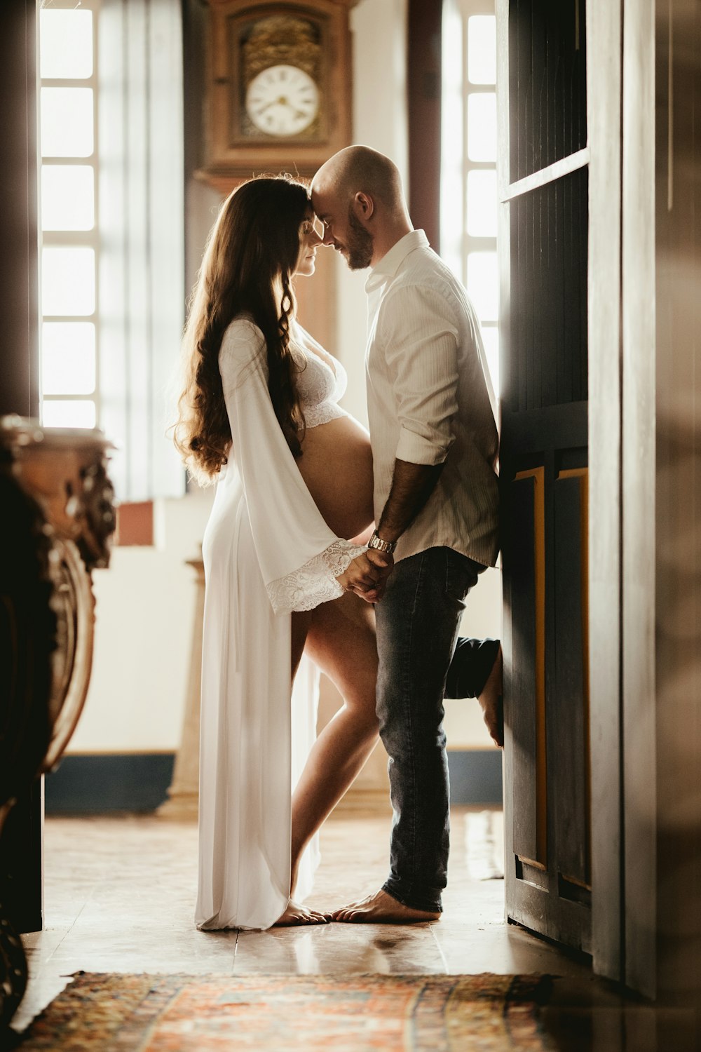 couple standing near door