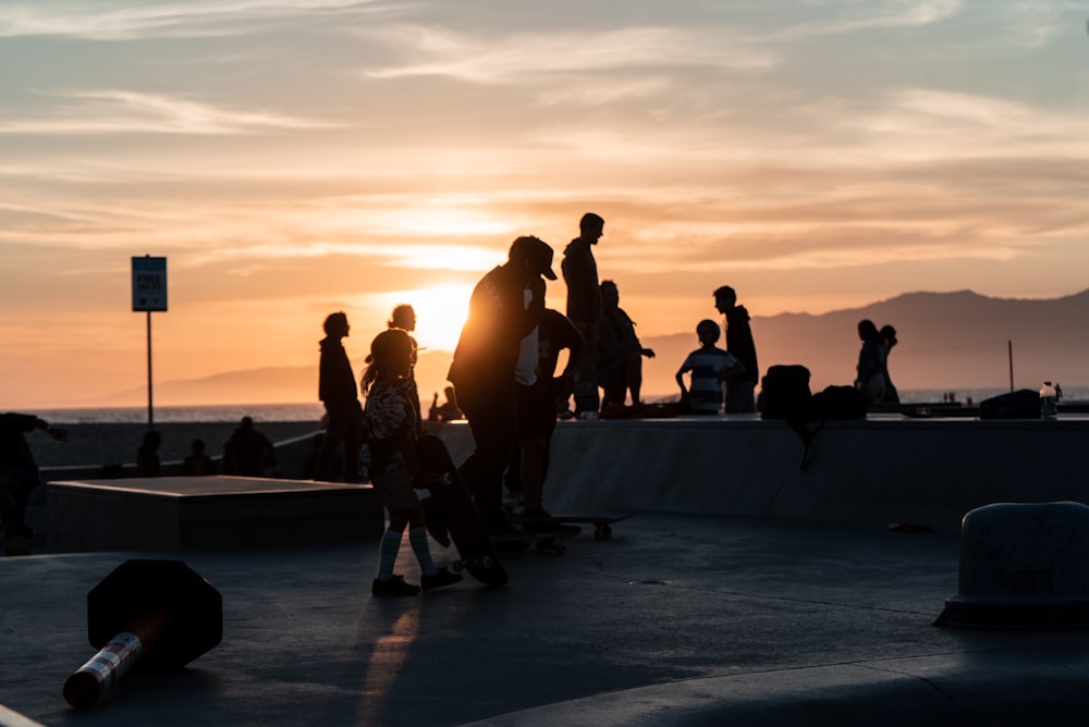 silhouette of people during golden hour