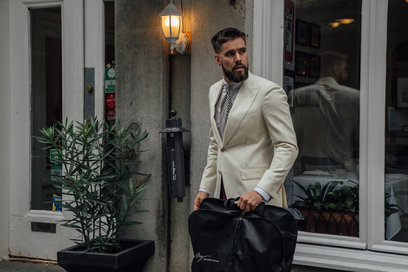 Man carrying garment bag
