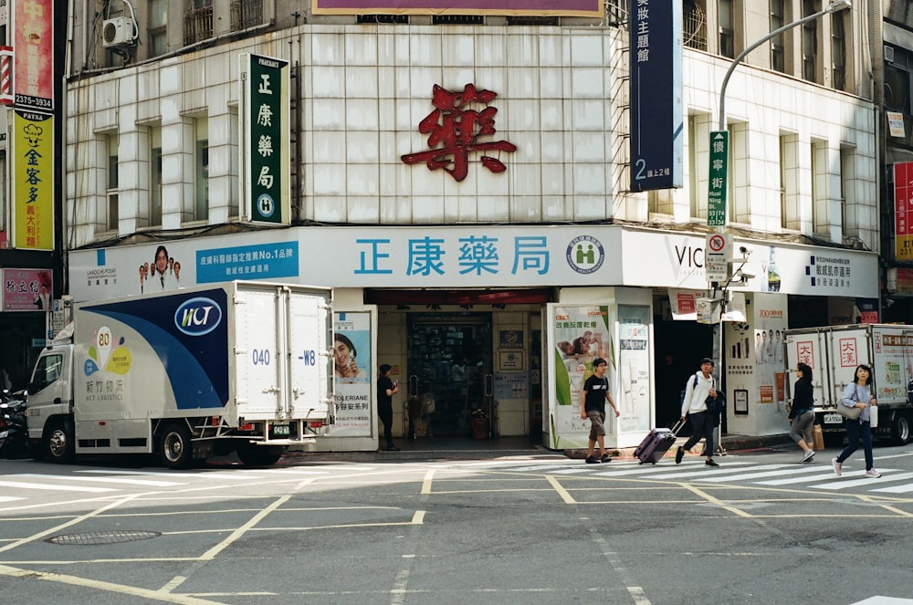 people walking on pedestrian lane