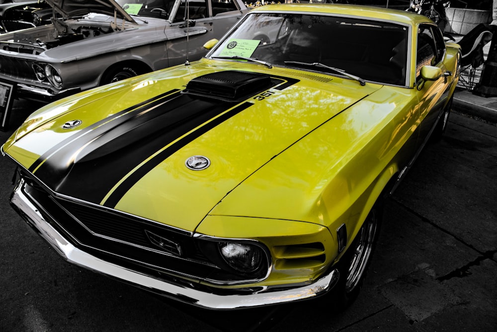 parked yellow and black coupe