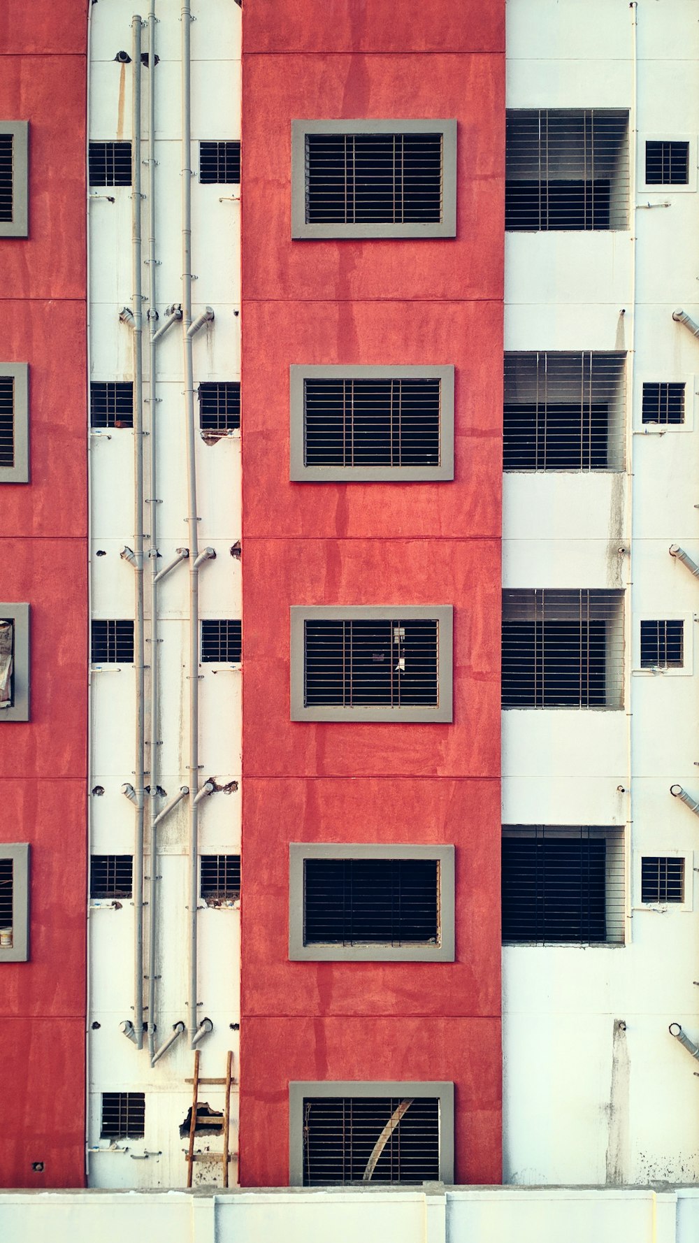 red and white concrete building during daytime