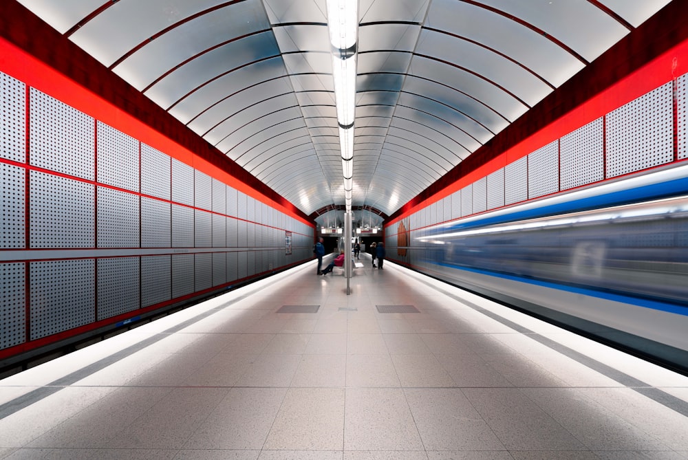 people standing on subway