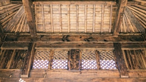 A close-up of intricate carpentry work in a home.