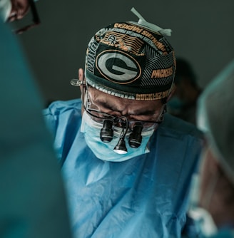 doctor wearing Green Bay Packers hat