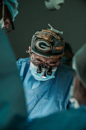 doctor wearing Green Bay Packers hat