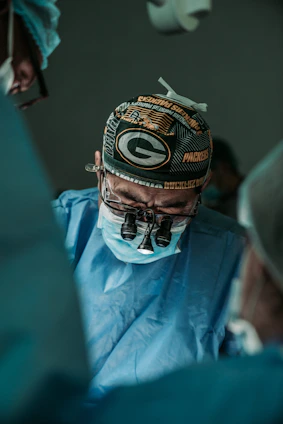 doctor wearing Green Bay Packers hat
