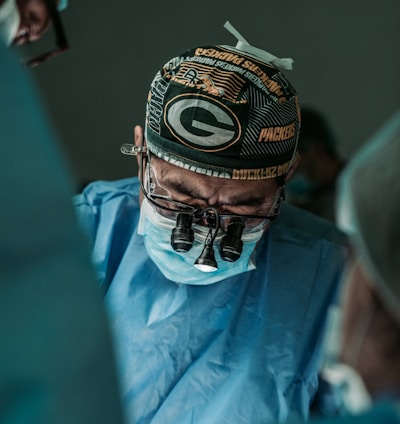 doctor wearing Green Bay Packers hat