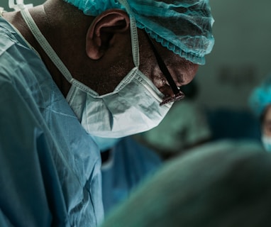 man wearing medical mask and robe