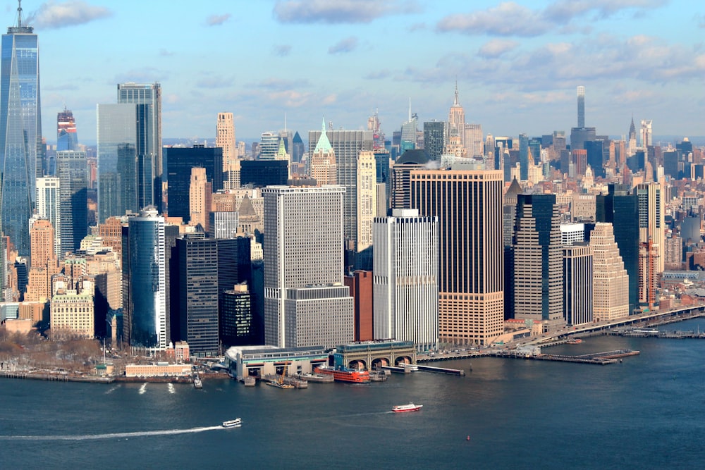 high-rise buildings beside body of water