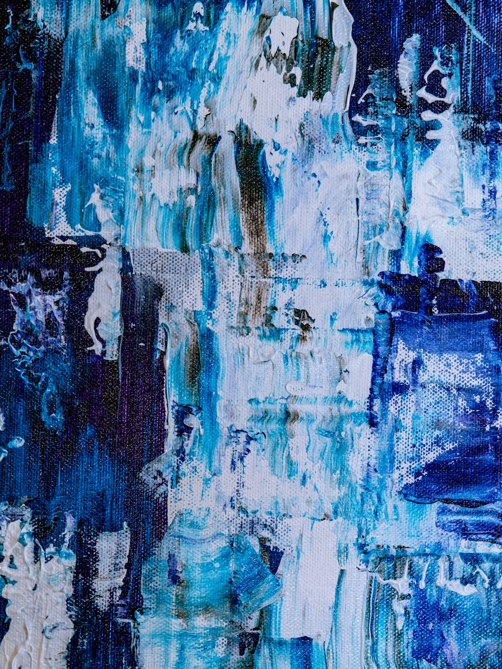 an abstract painting of blue and white colors