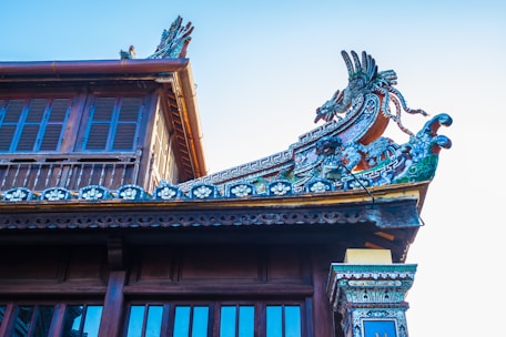 Close-up of a traditional Malang building facade with intricate details.